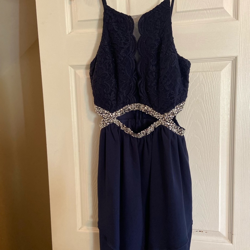 Knee-length rhinestone cut-out homecoming dress.